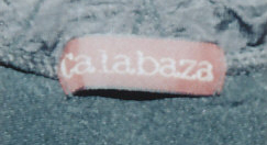 上着タグ部分calabazaの文字を撮影